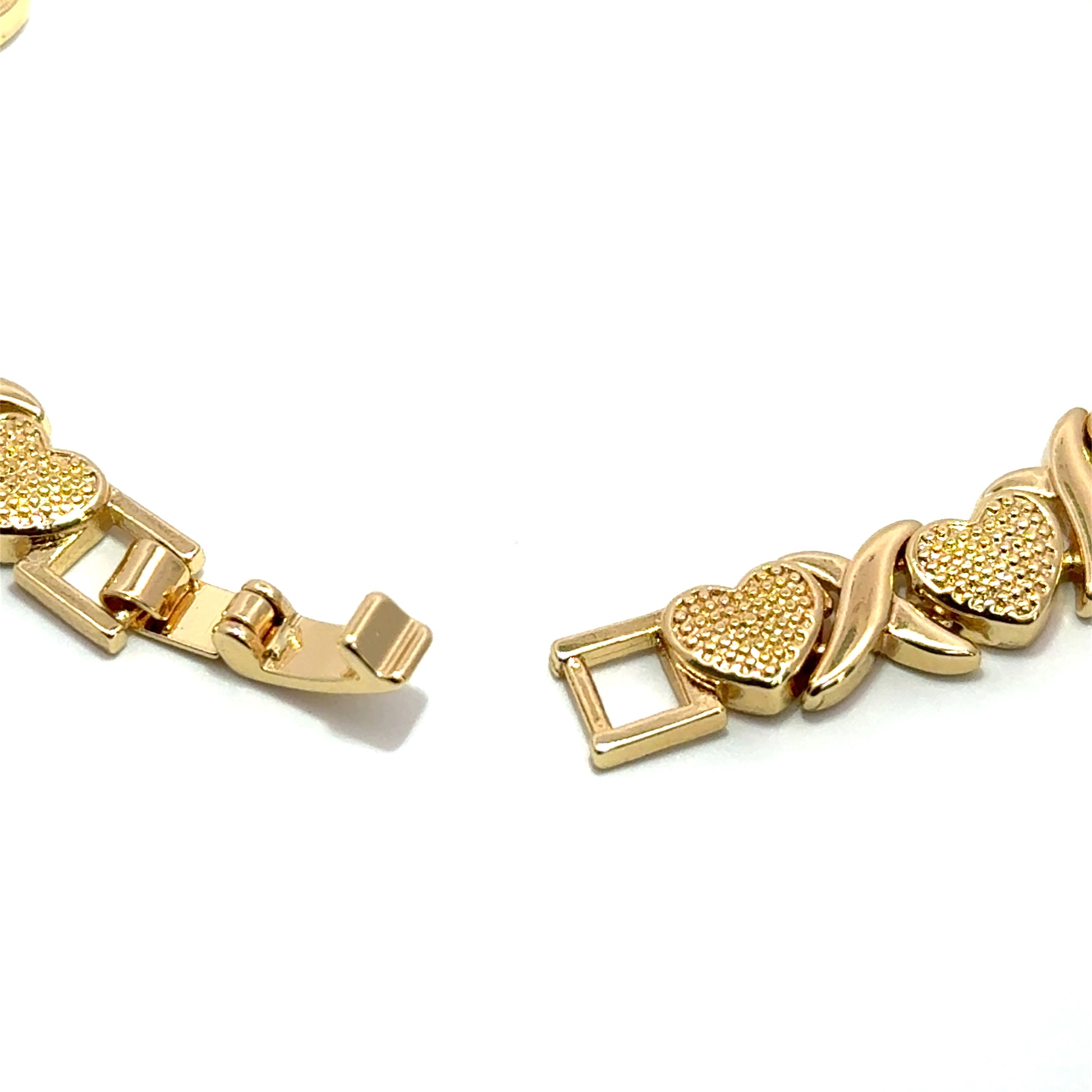 Bratara dama din metal comun, placata cu aur cu model inimioare